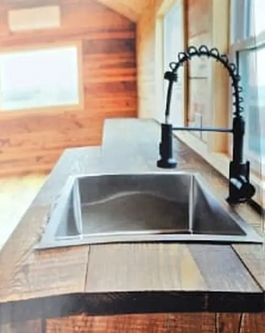 Kitchen sink — Timberstone solid-log cabin