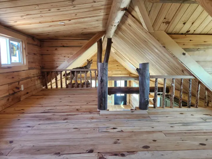 Loft view — Timberstone solid-log cabin