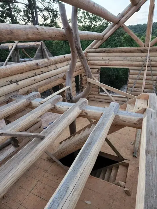 Log structure build — Timberstone solid-log cabin